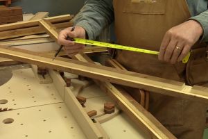 Truc pour trouver le centre précis d'une pièce de bois